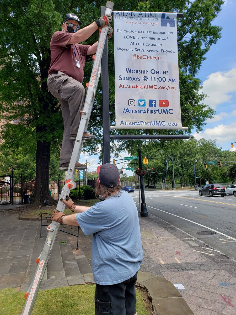 CarolColly's tweet photo. The #AFUMC banner crew at work this afternoon complete with masks and gloves. #BeChurch https://t.co/wWEnJzkygK
