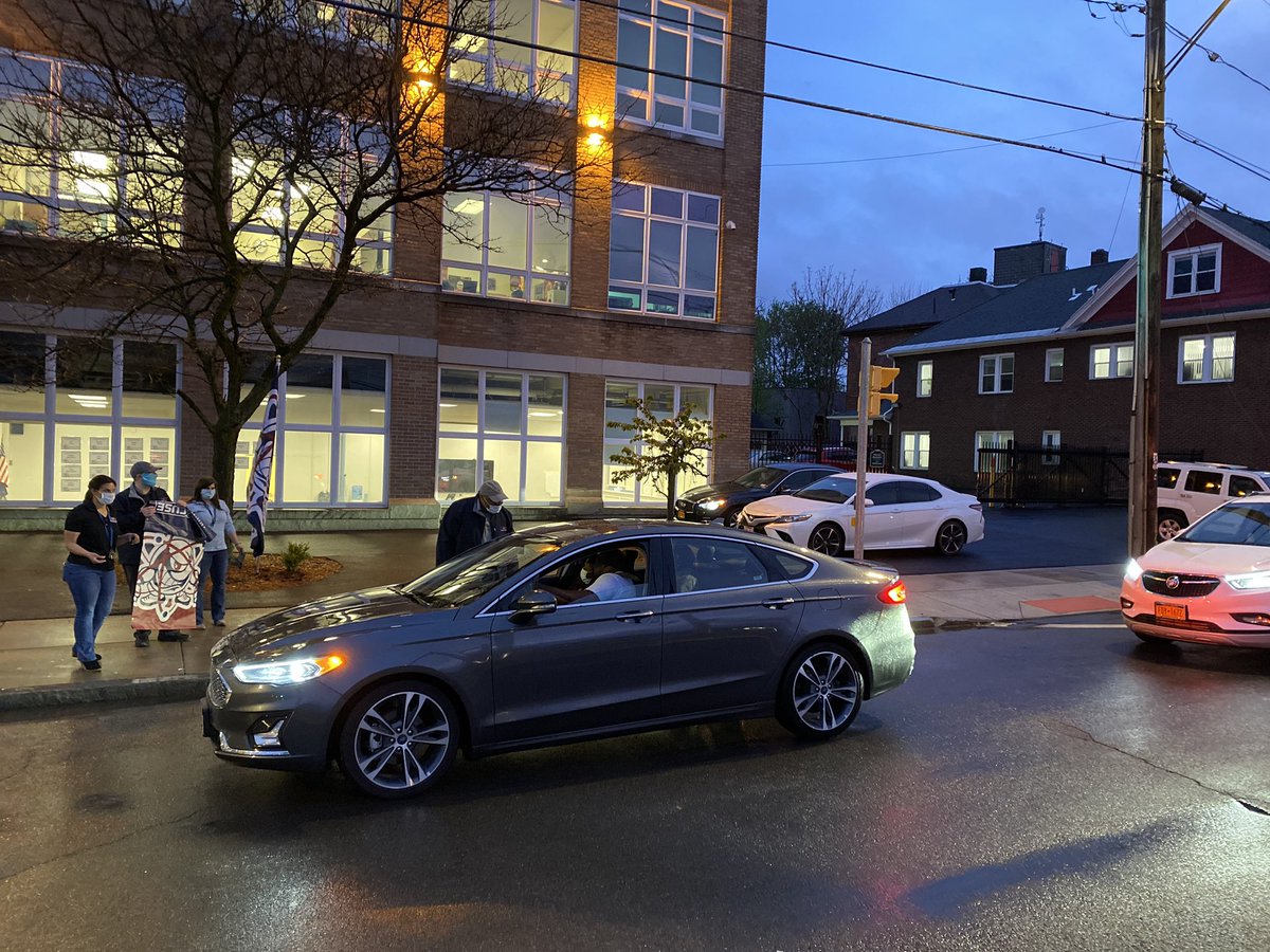 Celebrating our wonderful students especially for our <a href="/SyracuseAcademy/">Syracuse Academy of Science</a> seniors by lightning our  building. You all mean a lot for our SANY community.l, huge thanks for the great SANY Staff who came out &amp; organized this for our community!  We will overcome this challenge together!