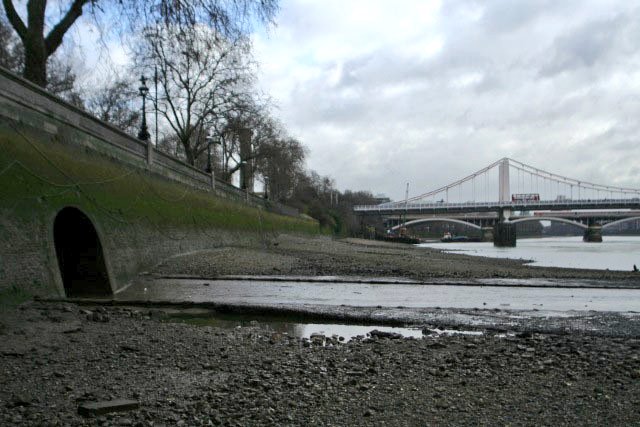 After flowing beneath a corner of Chelsea Barracks, the river flows into the Thames.