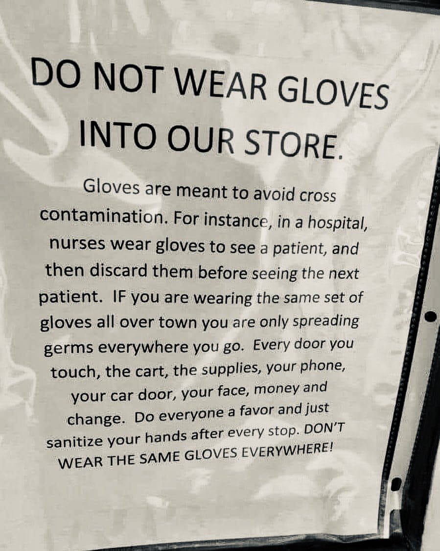 Seen on a supermarket door. The message is very clear. Do not wear gloves 🧤 Better to use hand sanitiser frequently during your shop