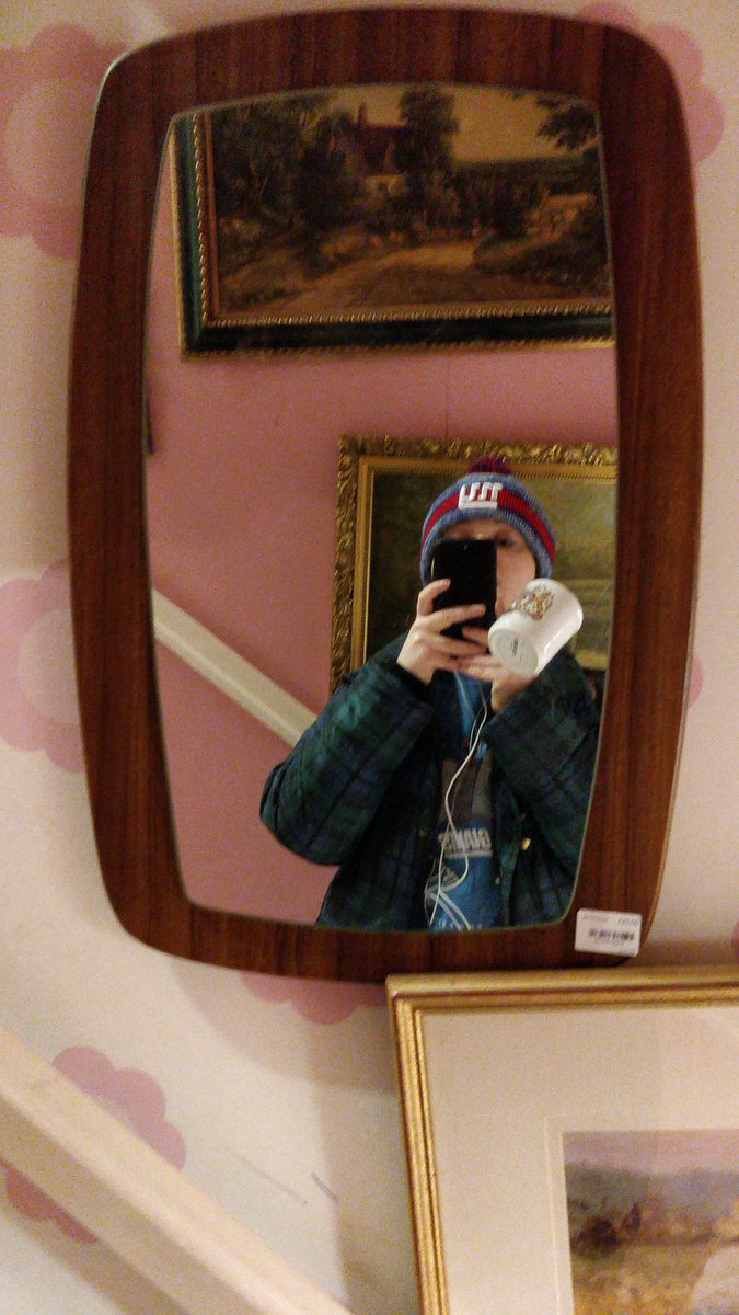 This is me in a charity shop, taking a picture of a mirror I thought I might go back for. I'm assuming it's still there