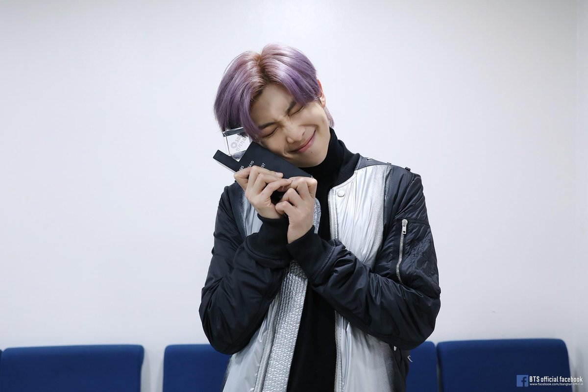 BTSRM_UK's tweet photo. So deserved #ON is a brilliant Track look at #RM’s face
He’s so handsome, happy &amp; proud
He’s hugging the trophies 
🥰😍💜

#MOTS7 #Trophies #BTS @BTS_twt #Namjoon #GrapeMon #aRMy #BTSArmy #RM #방탄소년단RM #남준 #방탄소년단알엠  #김남준 
#JoonieClub #KimNamjoon #MOTS7Comeback https://t.co/ikB0YBQyXl