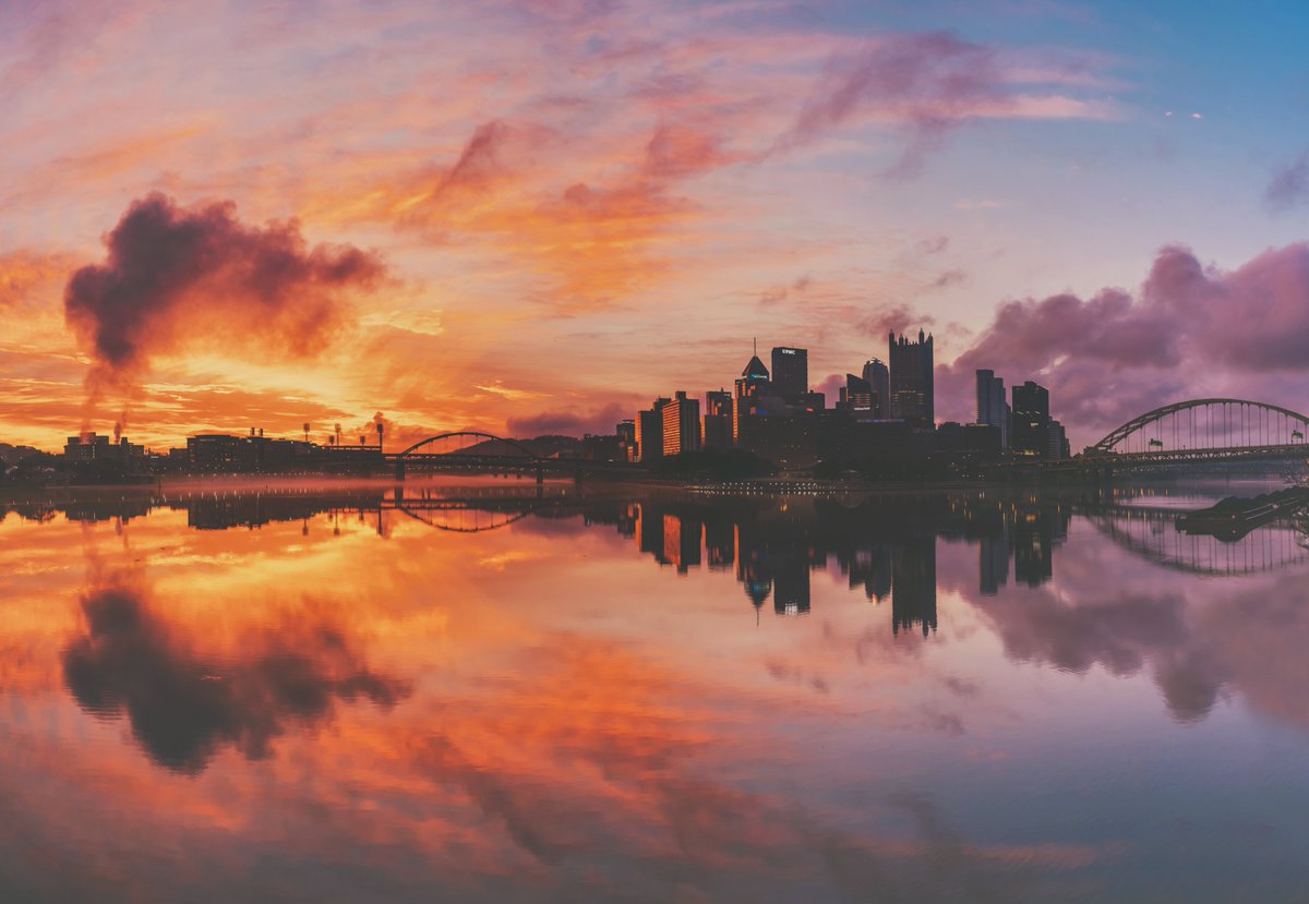 DaveDiCello's tweet photo. Certainly wasn't expecting a sunrise like this in #Pittsburgh today. I originally wasn't even planning on going into the city, but I'm glad that I did, because the sky lit up just before sunrise with incredible red and orange tones. The purple clouds were a nice touch as well. https://t.co/B66ORot7KL