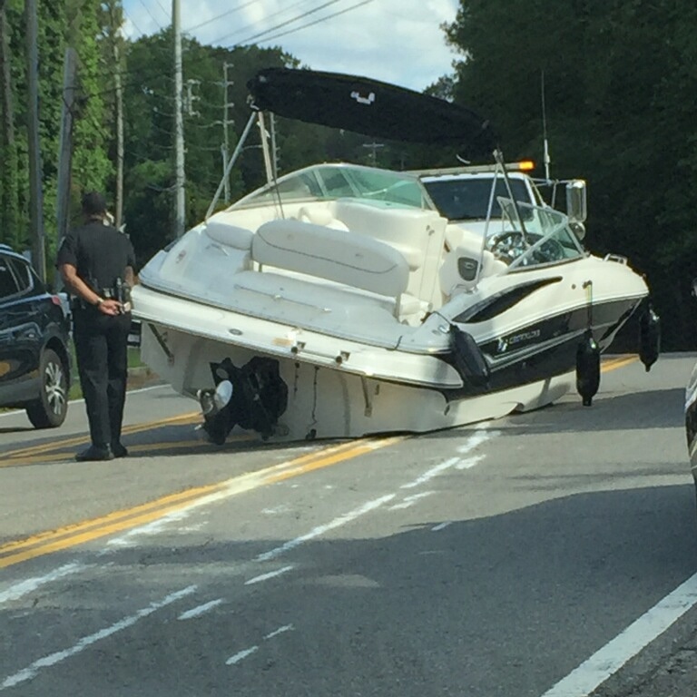 Saw this on our way home from #LakeAllatoona This is why you should ALWAYS use a secondary strap on your trailer.  This guy learned an expensive lesson.