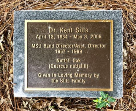 maroonband's tweet photo. The next time you're on the Drill Field between Lee Hall and McCain Engineering, be sure to visit the beautiful oak tree planted in memory of former Director of the FMB, Dr. Kent Sills. https://t.co/4UcIPyW0hv