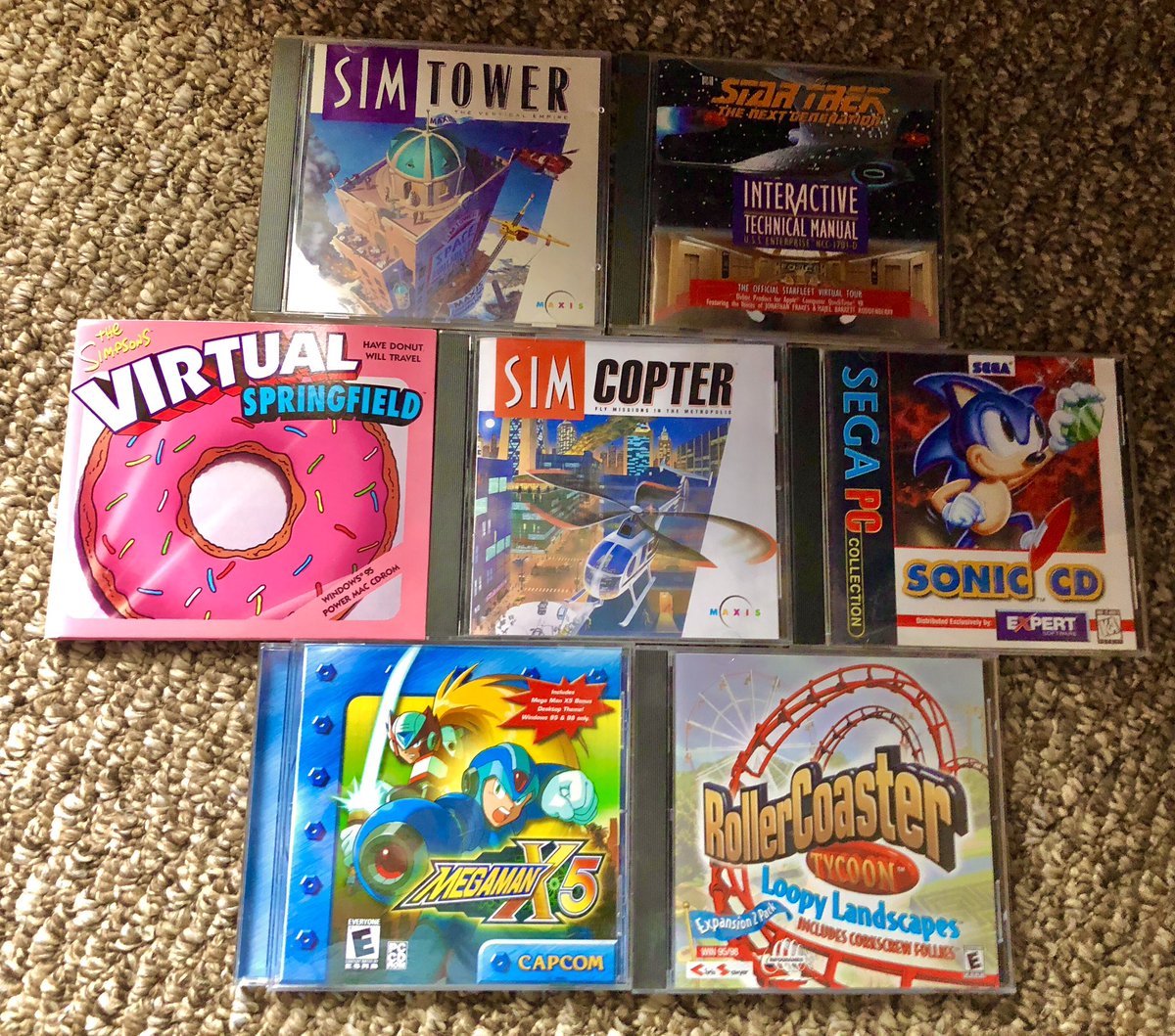 PressTheButtons's tweet image. I dug out some old favorite PC games today while unpacking from the recent move. #SimTower #SonicTheHedgehog #TheSimpsons #MegamanX #StarTrek