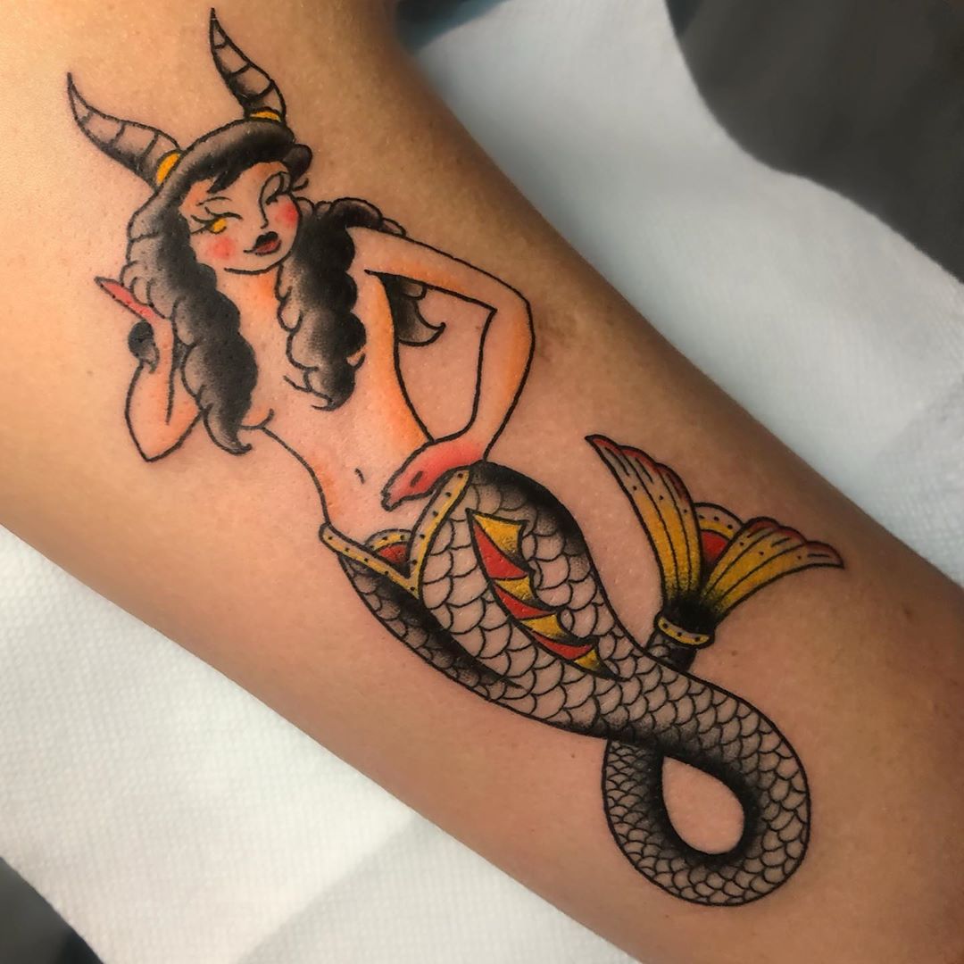 Cute Capricorn pin-up done a while ago by our lovely and talented  @minaxkate! ♑ If you are looking for bright, bold colors, she's the right  one for you! https://t.co/55xjNnZqhR #colortattoos #femaletattooartist  #orlandoflorida #, image size:1080x1080
