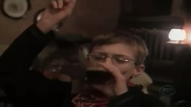 Shots of kids pretending they're drinking to excess on root beer.