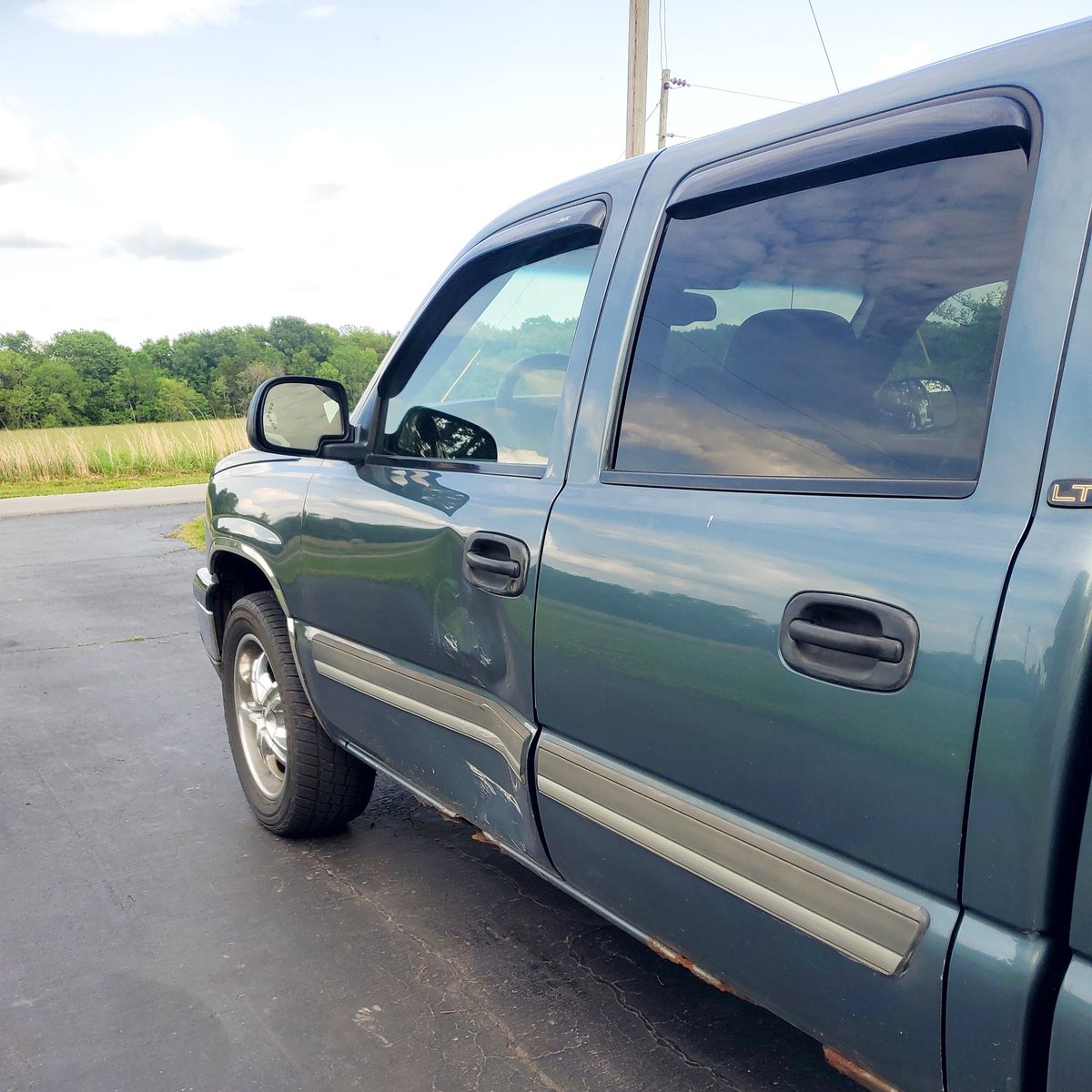 JessnEricL's tweet photo. Sooo I backed into the truck...at school...while packing up my room. He handled it well... the van is a tank. Thanks Uncle Josh for coming to the rescue.. https://t.co/JWNMgUHIOy