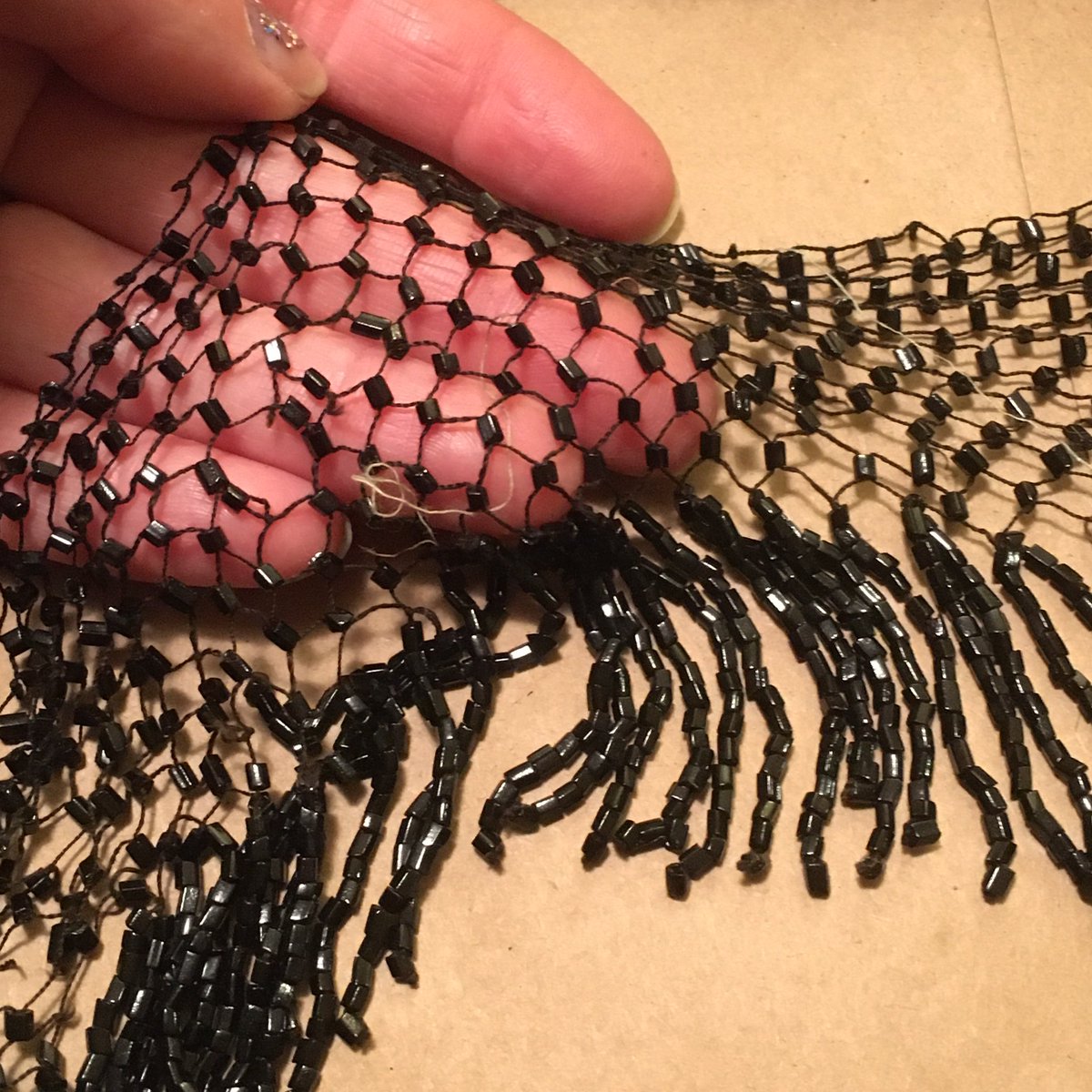Some of this is so extremely fragile I’m holding my breath untangling it. Look at this beaded net: