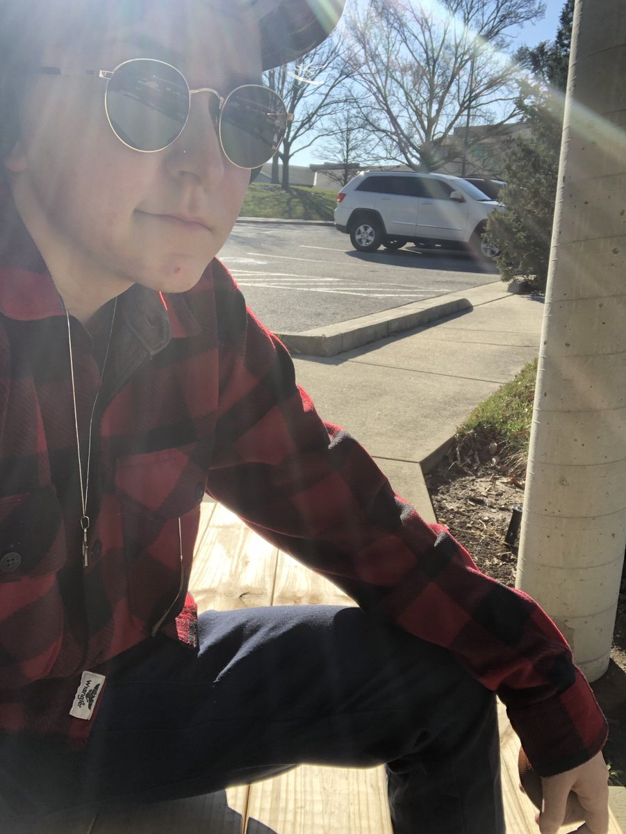 juliengalyon's tweet photo. this terrible selfie of me sitting outside my apartment building. i miss it. https://t.co/P5a7ug7nST
