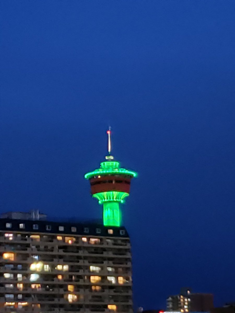 jamesa_king's tweet photo. A bit far away from our balcony but great to see the @TheCalgaryTower lit up tonight for #celiacawarenessmonth! #getyourglowback https://t.co/OcWsJthnLu