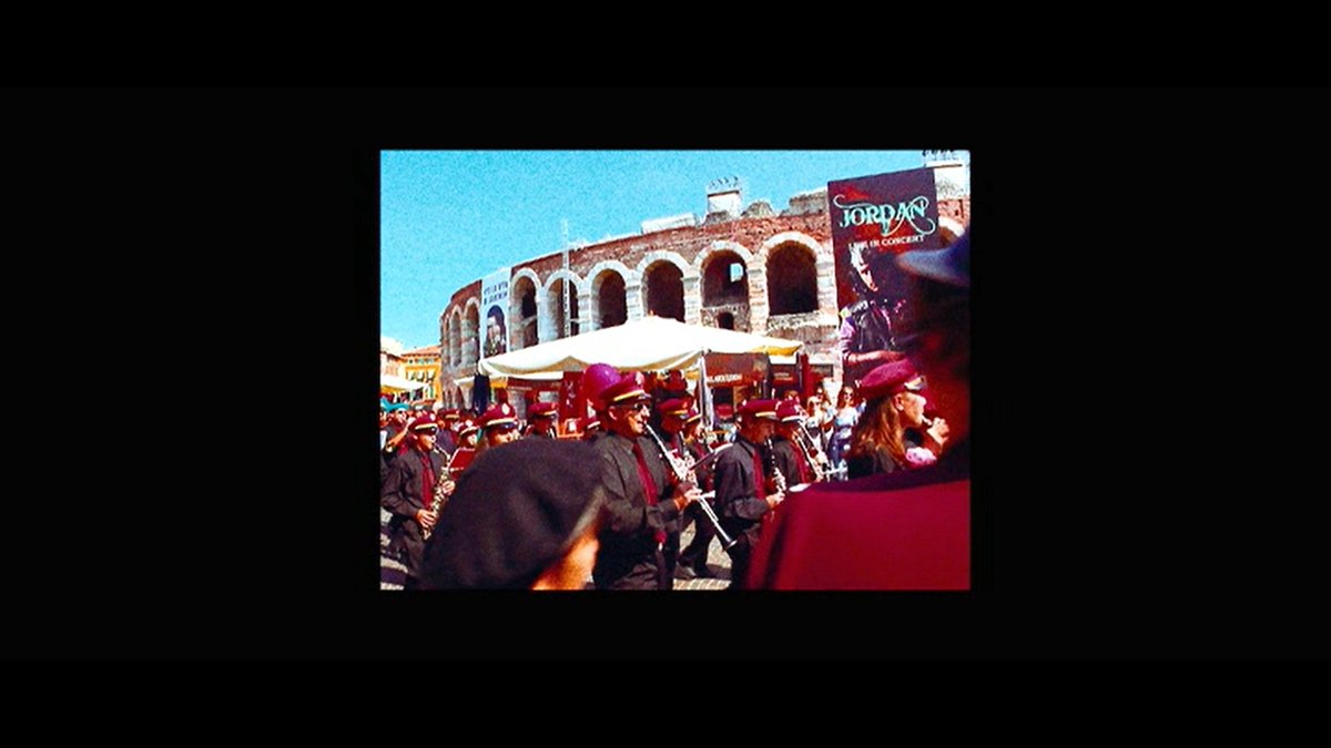 The story beings somewhere in Europe where Jordan, the protagonist is already a cult-music-icon. People are thronging in lines, buying his shirts, yelling, and shouting his name. There's an enigma around is all we know from these shots. They are shot in 5D, some by RK himself.