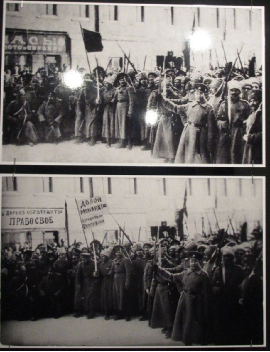 To show how Jewy the 1917 revolution wasthis image was retouched and the orginal background sign was changed from "jewelry, gold, silver" to "all your needs will be gained in struggle"Motherfuckers are too lazy to have political riot 5 blocks away from where they live