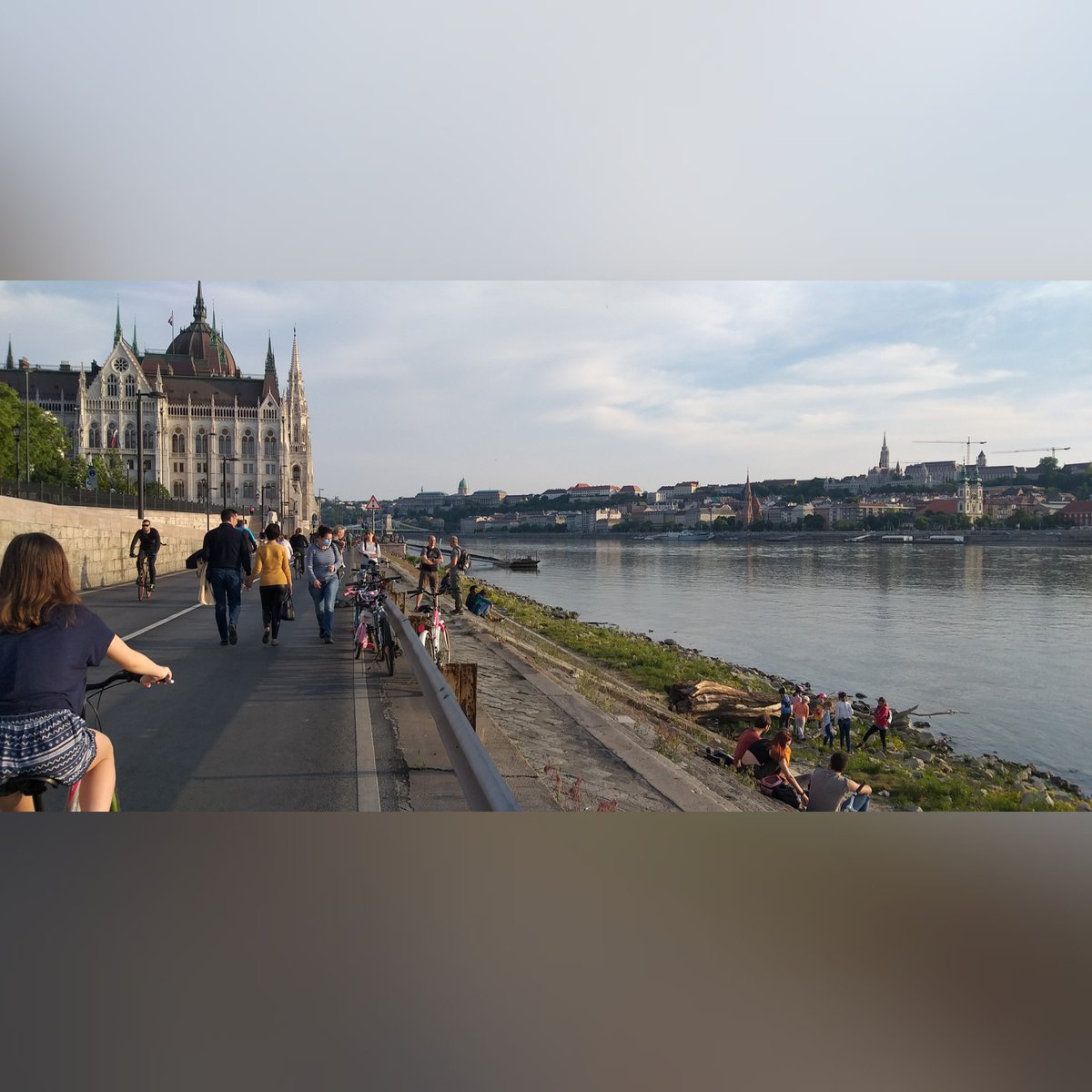 AdamBODOR1's tweet photo. Next step after the pop-up cycle lanes - Danube river bank in Budapest is open for people! Cities for people - This should be the real function of this prime public space  permanetly! https://t.co/9kWmzWQMRh