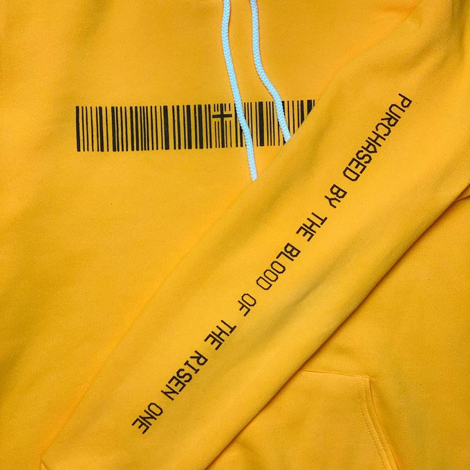 Kick starting the day with this yellow &ldquo;Purchased By The Blood&rdquo; hoodie!   This can be found EXCLUSIVELY<a href="/tag/riskitall2018"class="tags"><span>#riskitall2018</span></a>