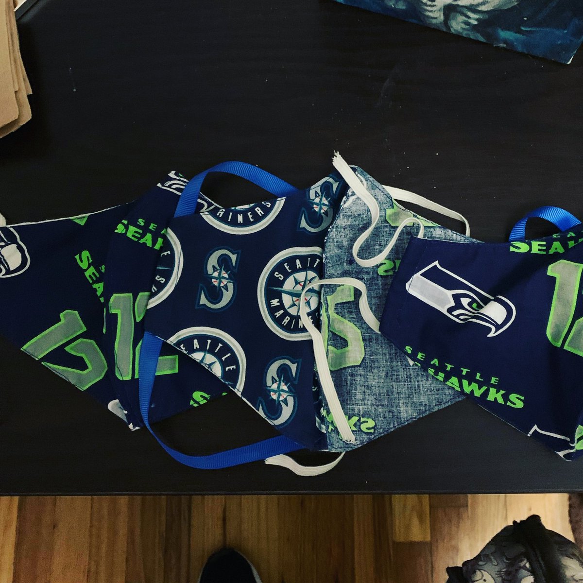 Coopz22's tweet photo. .@12s we are representing the @NYCeahawks during #NYonPause, featuring @Seahawks and @Mariners masks! https://t.co/xVzTp80F0A