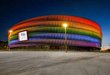 Millar_Colin's tweet photo. Athletic Club Bilbao's beautiful San Mamés beside the river Nervión lit up on the International Day against LGBTIQphobia 🌈🌈 https://t.co/ZNnIaAt0GW