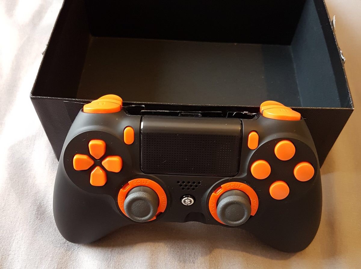 gamestation_gh's tweet photo. Scuf Gaming Controller for PS4 and PC 
Available Now! @gamestation_gh 

Iconic Details: Remappable paddles, Interchangeable thumbsticks, Adjustable triggers, and much more! https://t.co/TkQ5SWNFdu