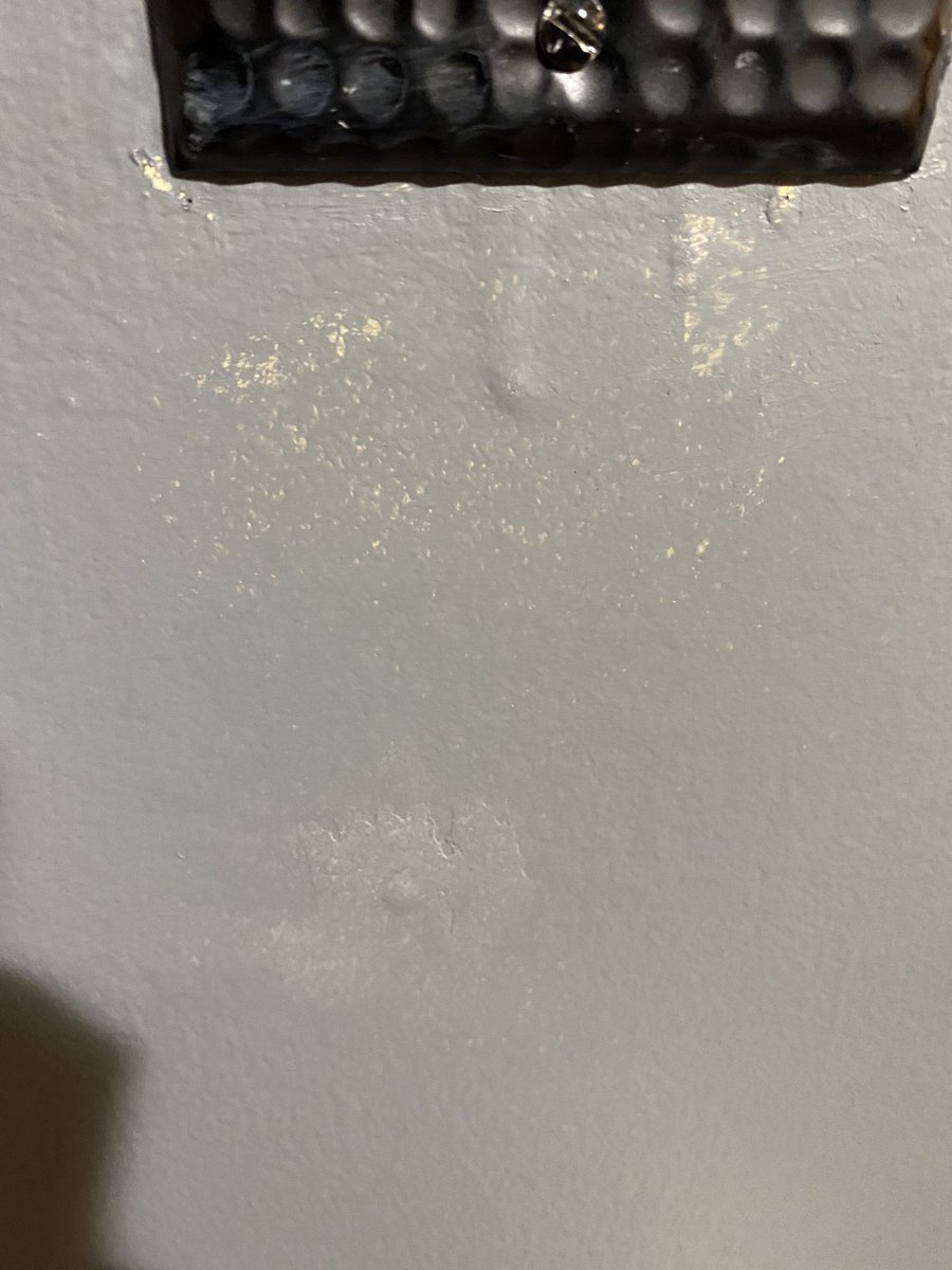 Lol so, since a mysterious figure appeared in the wall patch. I’m once again sanding and repainting. Also the drop stood out. Used steel wool, seems mostly smooth. Better than it was and idiot free