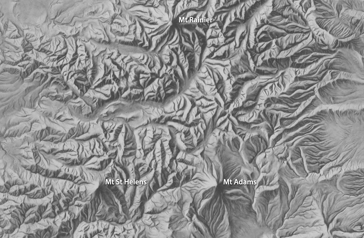 MtnMapper's tweet photo. Today is the 40th anniversary of the Mt. St. Helens eruption. This old shaded relief of Washington, produced by the USGS for a 1:1.5 million state base map, shows the mountain when it still had a pointy top. https://t.co/czrECIFRNu