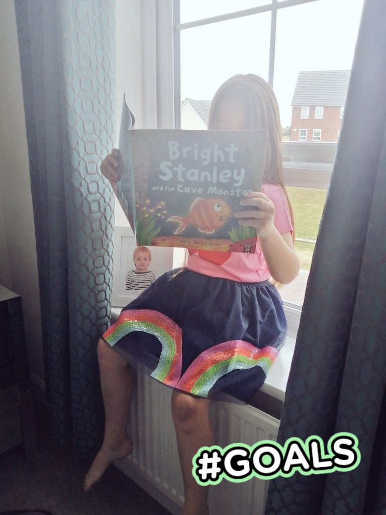 Chloe is smashing her reading challenges... Here's her "reading in a strange place" effort... On the window ledge!? <a href="/stbedesinfants/">St Bede's Infants</a> #readingambassador