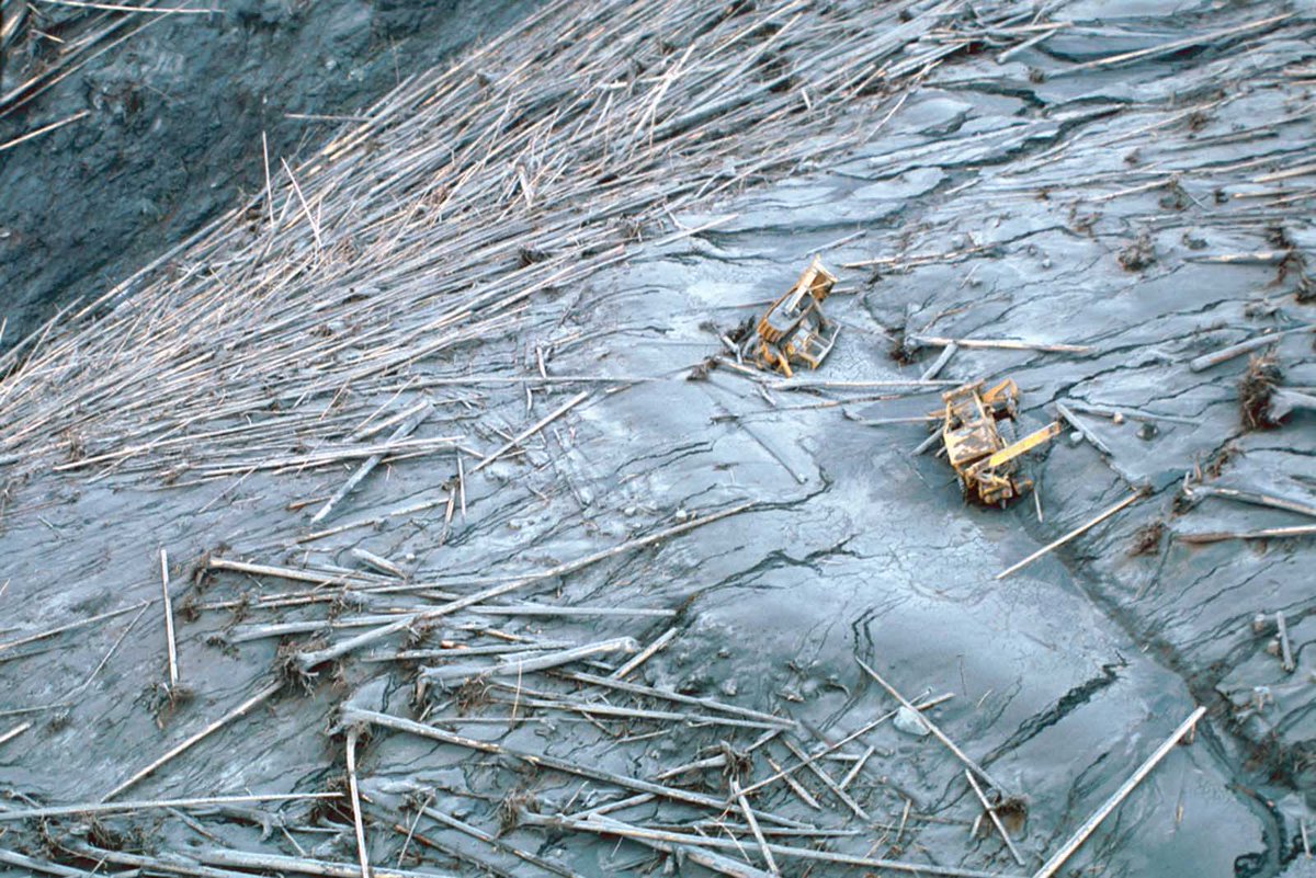 Glicken hurried back to the scene of the eruption, overwhelmed with panic, grief, guilt. He took 3 separate helicopter flights desperately searching for the remains of the buried and blasted Coldwater II camp without success. They found bodies elsewhere but nothing of Johnston.