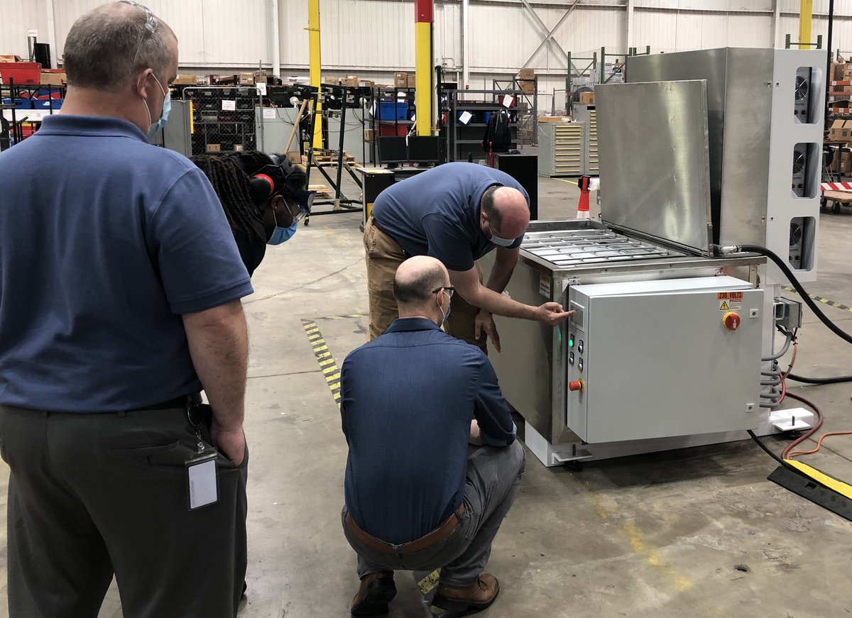 We're wide open for business and doing whatever it takes to protect our customers and staff.  Power Solutions International came in for final approval and training on a custom-painted Liftkleen -- so we did it after hours, fully masked and standing as far apart as possible.