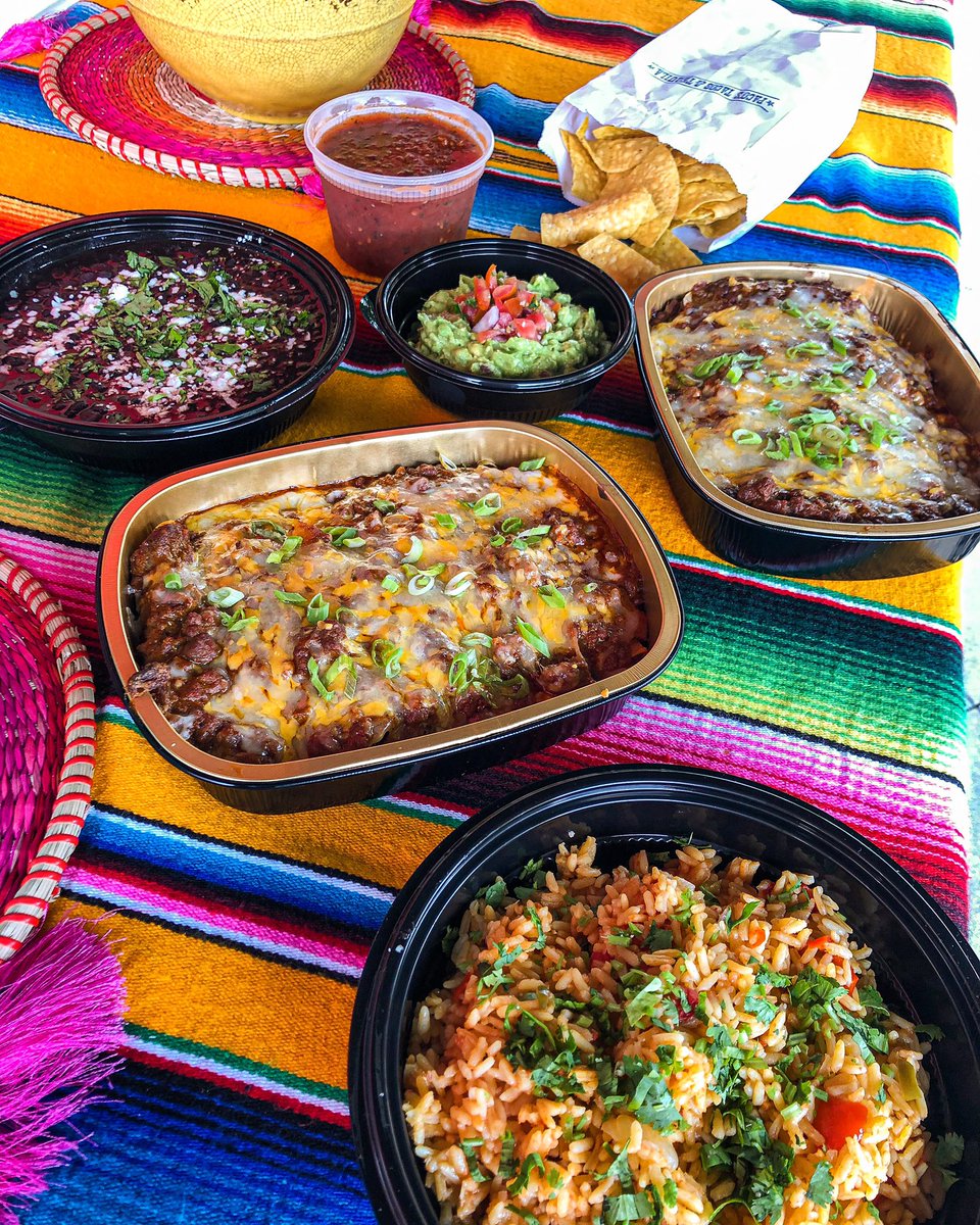 GIANT ENCHILADA MEAL. A dozen cheese enchiladas for you to reheat at your leisure. Comes with guacamole, salsa, chips, rice and beans aka a fiesta feast. $40 and available in extremely limited amounts online or by phone.