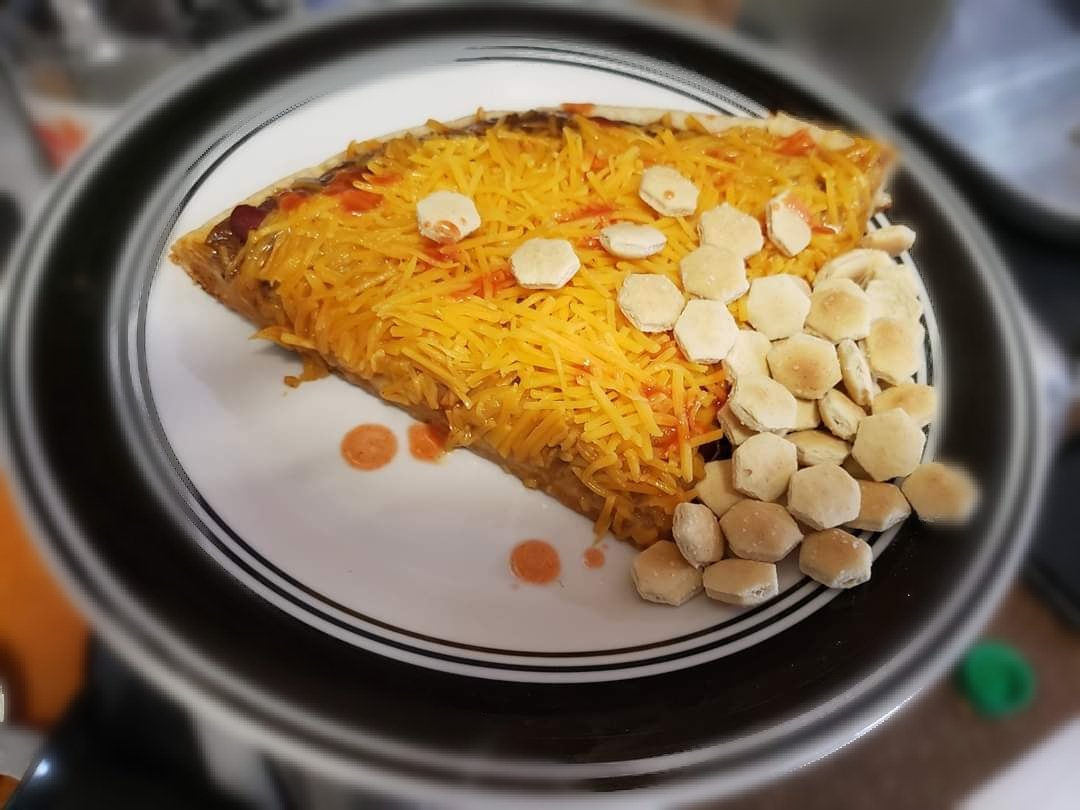 Hayesse's tweet photo. @Skyline_Chili I feel like I should apologize for not believing that this recipe would work. #Amazing #SkylineTime #SkylineChiliPizza https://t.co/NtS7HxvIIf