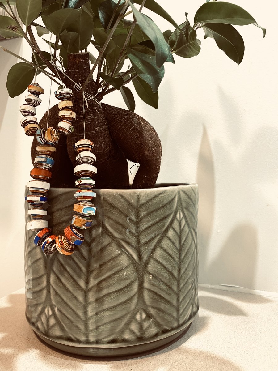 sasharouzier_'s tweet photo. Making necklaces out of cereal boxes in my country #Haiti is very popular. First you cut out cereal boxes in thin strips #sustainablefashion #objectmaking.
Secondly, you roll them super tight around a stick and put glue all over them. #creativity #jewelry #ecofriendly https://t.co/fnioay3LJD