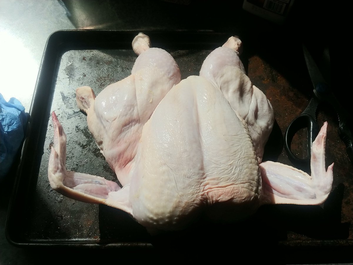 RobMeekel's tweet photo. Got 3 chickens from #StuffMart to deal with. Flattened #1 and put it on the @PitBossGrills smoker https://t.co/MN3UJzlAc0