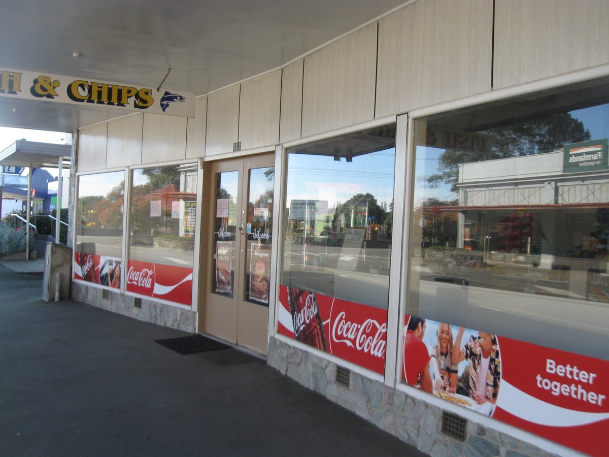 Still more Main St, Otautau photodocumentary, pre & post Covid street scenes: 1. Started as small wooden shop next to original butchers, used over years by many local shops, CC 0; Burned down & rebuilt; 2. Merv's Menswear during 80s-90s CC BY; 3 & 4. Then & still Takeaways. CC BY