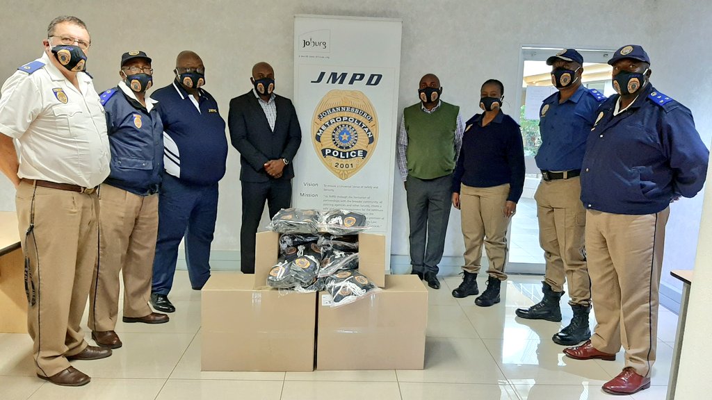 JoburgMPD's tweet photo. As #Covid_19 cases increase, precautionary measures are important in ensuring that our #JMPD officers have proper &amp; sufficient cloth face masks. Gratitude goes to Motorola Solutions South Africa @MotSolsEMEA/
@MotSolsSSA who have donated 
15 000x double branded 3x ply face masks. https://t.co/hDuhabrPv7