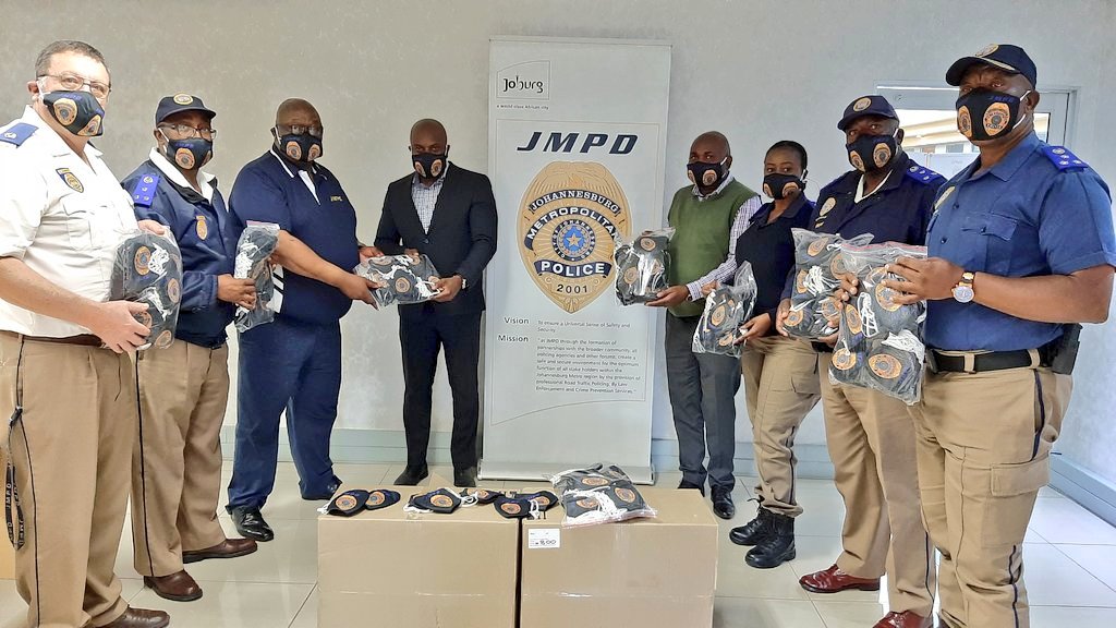 JoburgMPD's tweet photo. As #Covid_19 cases increase, precautionary measures are important in ensuring that our #JMPD officers have proper &amp; sufficient cloth face masks. Gratitude goes to Motorola Solutions South Africa @MotSolsEMEA/
@MotSolsSSA who have donated 
15 000x double branded 3x ply face masks. https://t.co/hDuhabrPv7