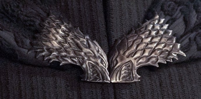 The two direwolves on the crown also reminded me of the cloak clasps on Robb’s cloak, which he wore the day he died (at the Red Wedding).