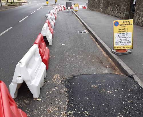 Next … another pharmacy in  #Wadsley. Could almost be useful if it were connected to anything else. Pity the temporary dropped kerb is blocked by the sign heralding the parking restriction.