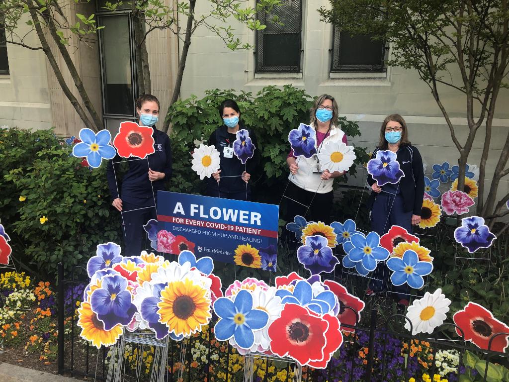 PennMedicine's tweet photo. Hope grows here: At the Hospital of the University of Pennsylvania, every time we discharge a COVID-19 patient to go home and heal, we place a flower in their honor in our garden. We’re happy to report that the garden is bursting with blooms. 🌷 https://t.co/tUfd0dSJyS