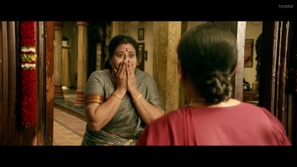 This is a nice scene I thought of mentioning. Mani's mother reaches her home precisely five minutes before 6'o clock when the self-imposed restriction of not speaking would break. It is also funny. And Look at the Suriya's reaction in Pic 4. Sincere actor!!