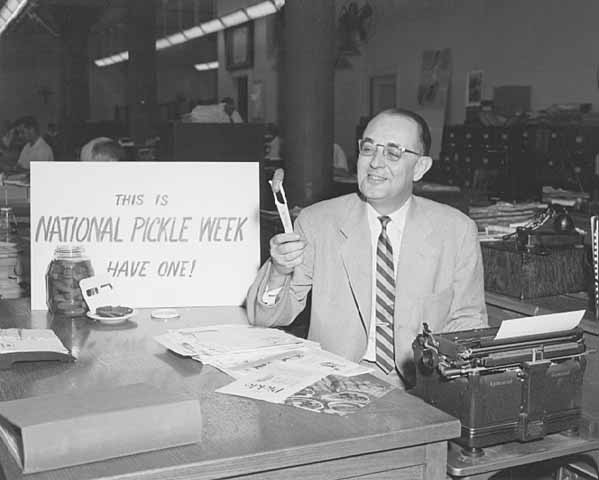 mnhs's tweet photo. It's International Pickle Week! Here are two pickle-related photographs from our collection. The first is of the "Pickle Club" of White Bear Lake in 1890, and the other is of Thomas Dunning Rishworth working on an advertising campaign for National Pickle Week in 1959. https://t.co/QqWf86zrMk