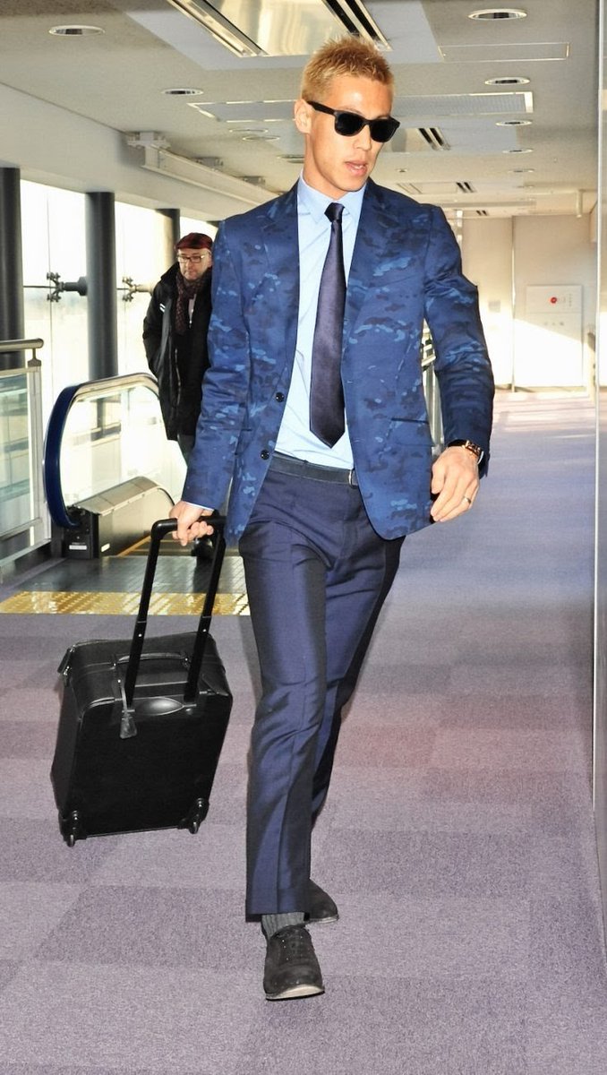 7. Keisuke HondaHe's a Japanese midfielder who's had stints in Russia and Italy with Moscow and AC Milan respectively.He currently plays in Melbourne, Australia and clearly his time in Europe reflects in fashion style.His corporate fashion sense also makes a statement.