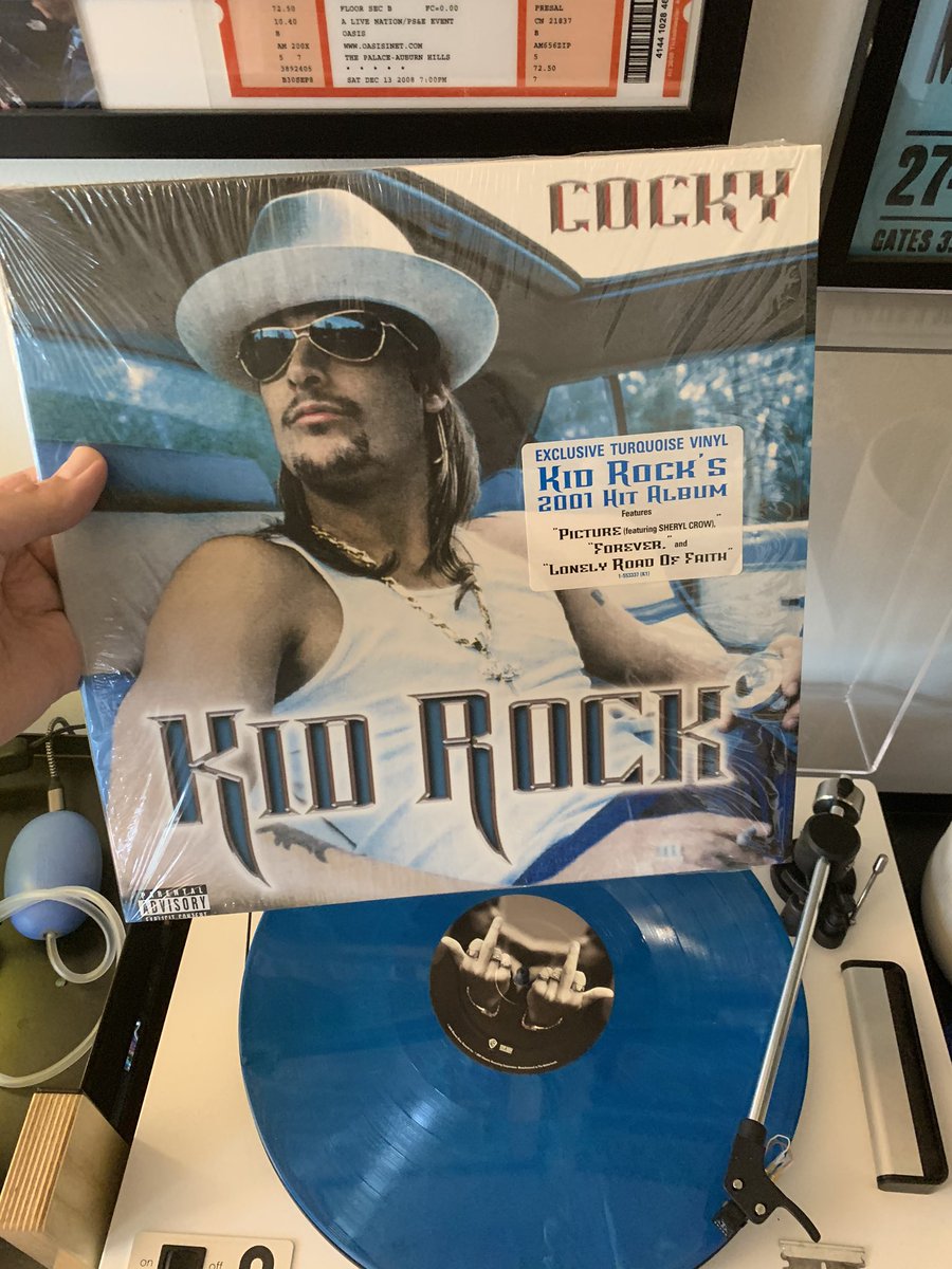 61) this asshole couldn’t pass up the amazing opportunity to own a Kid Rock album on turquoise, especially for the small price of $7.63