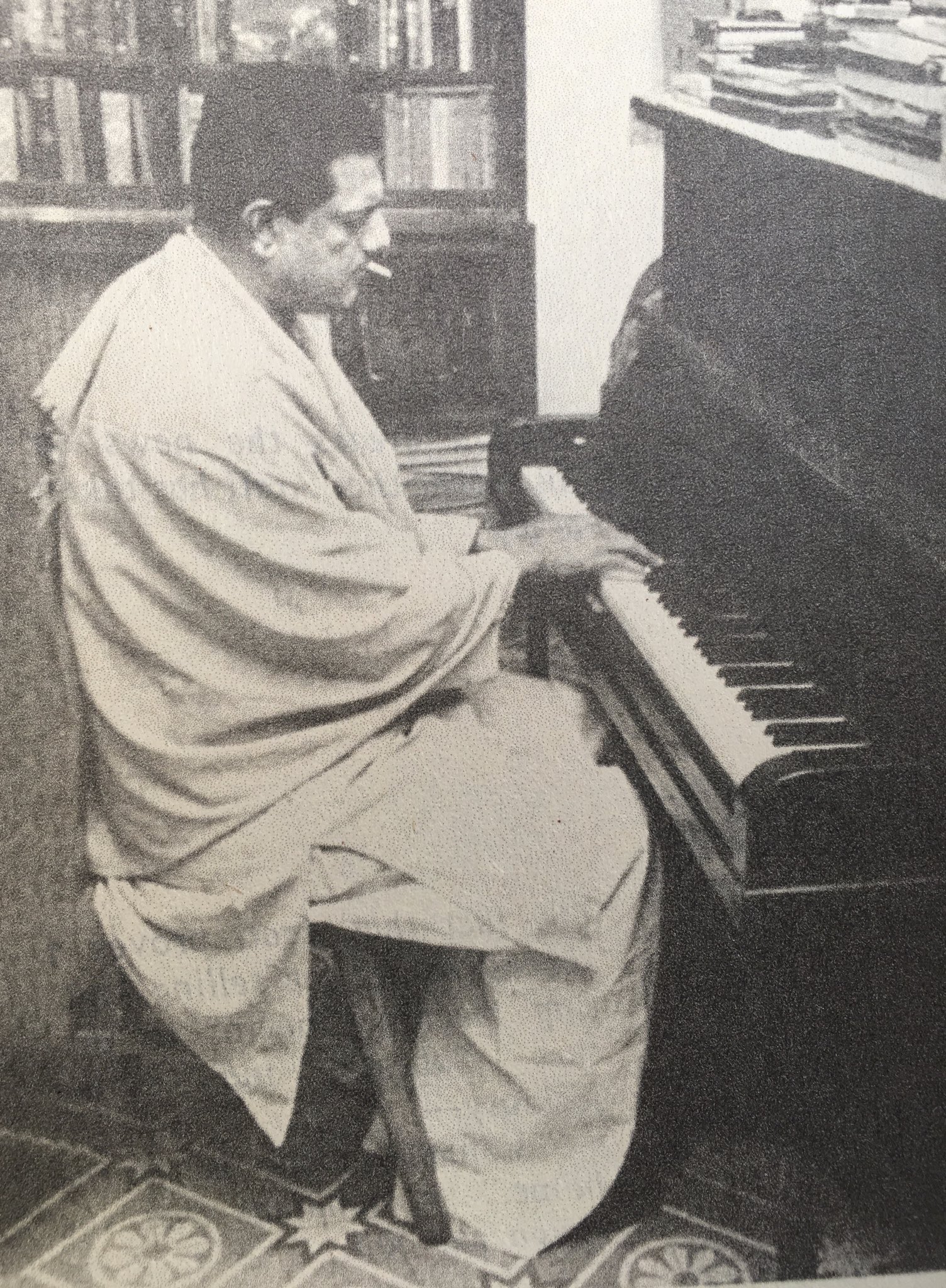 Kaushik Basu on Twitter "Satyajit Ray at home, composing music for one