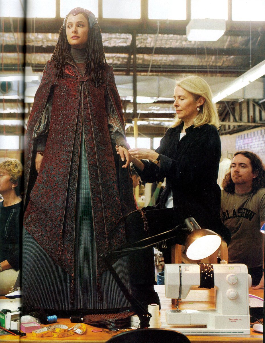 26. peacock gown (rots)all over the marketing and then cut from the film. this one is elevated by the colors, which provide needed visual contrast, and the structured look of the pieces. would've ranked it higher if it weren't for the hair.