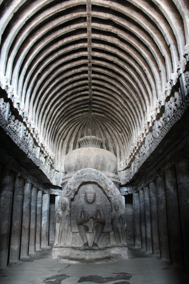 Buddha in vyakhyana mudra (teaching posture) is carved. A large Bodhi tree is carved at the back. The hall has a vaulted roof in which ribs have been carved in the rock imitating the wooden ones.