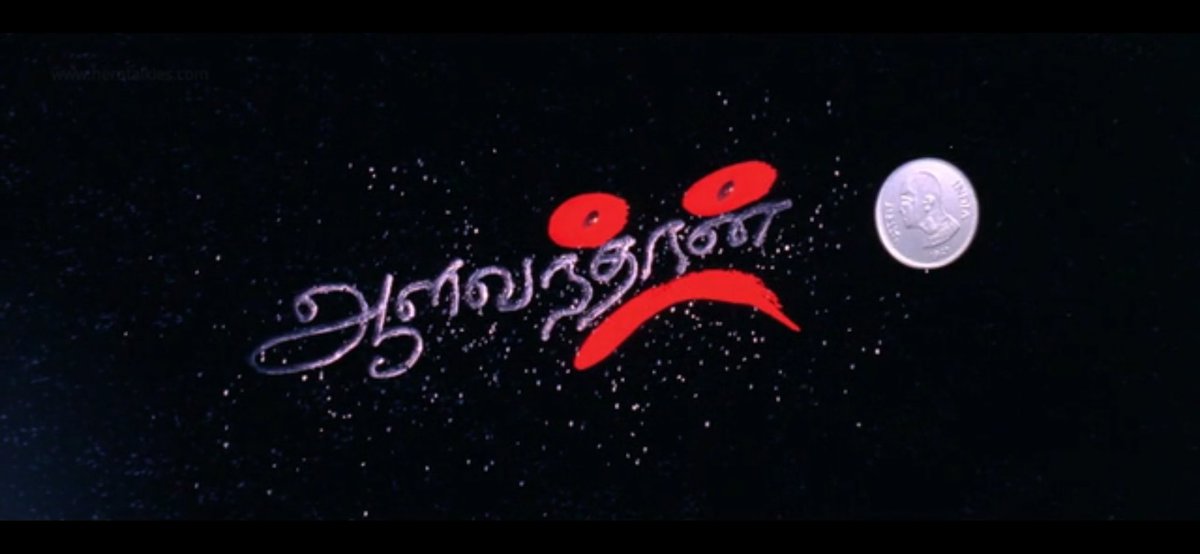   #Aalavandhan Title : A Coin spins on a surface and scratches it,forming the title. How a toss is going to affect the lives of a twin brothers.The head side of the coin and the symbol :( in the title represent that the story is going to be in Nandhu& #39;s perspective.   #KamalHaasan