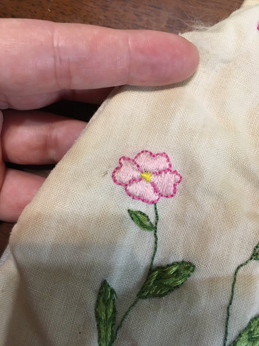 At another spot in the book, Sophie has been making a court gown with embroidered flowers. In my head, they looked like these "wild roses" that I actually cribbed from my dad, who is a scrimshaw artist.