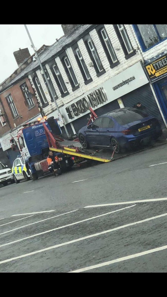 Cars being lifted for forensic investigation.