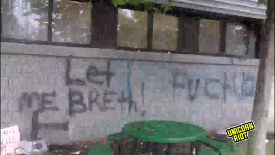 A glimpse of some of the graffiti that just went up on the Minneapolis Police 3rd Precinct: