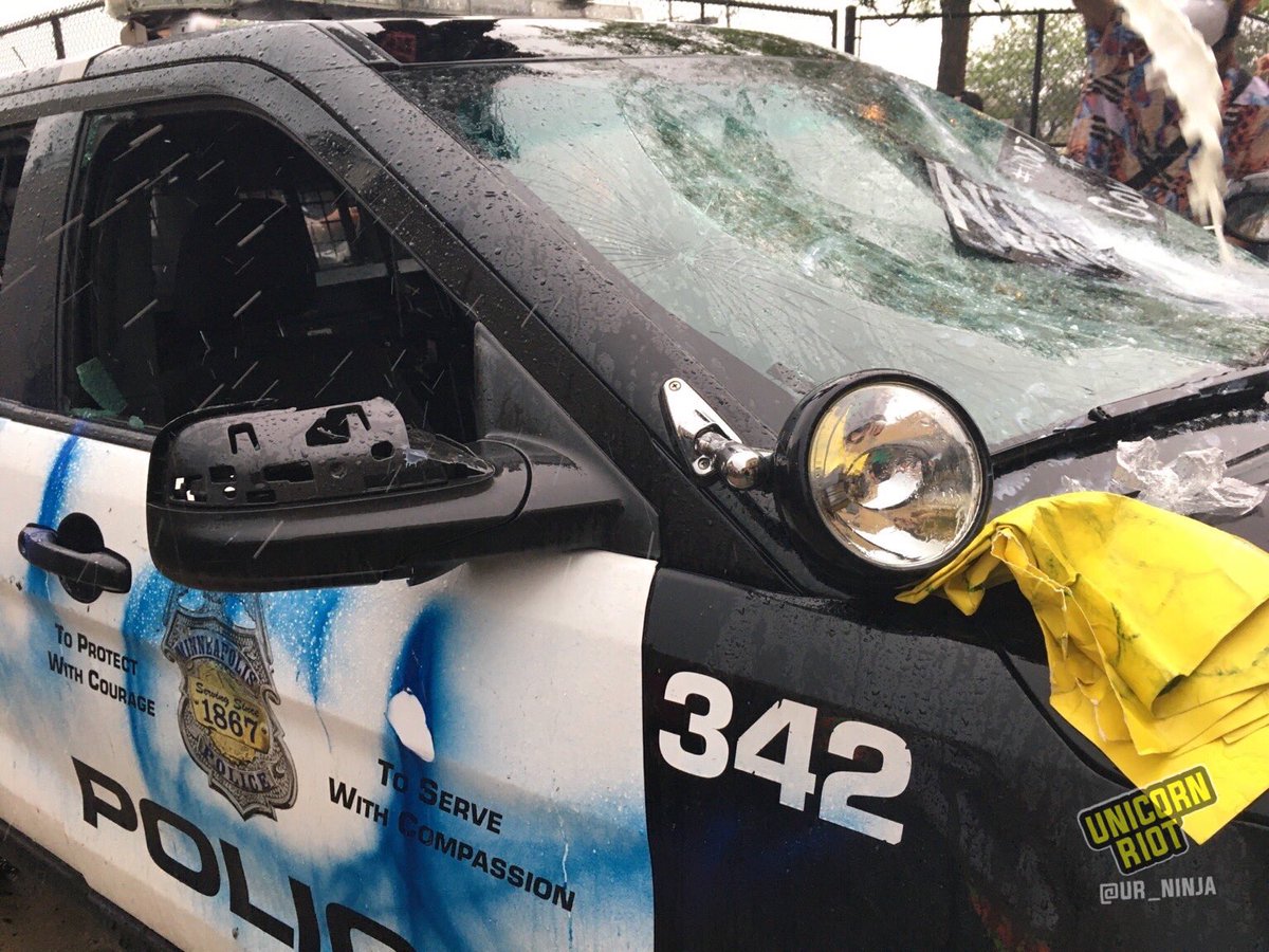 Police cruiser smashed up outside MPD 3rd Precinct